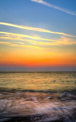 Beautiful summer sunrise over the beach