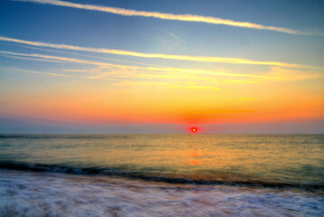 Beautiful summer sunrise over the beach