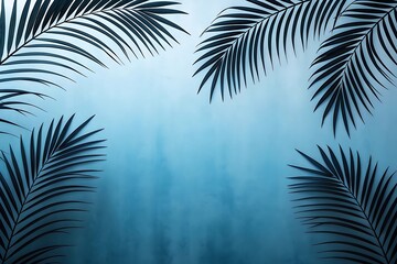 Fototapeta premium Palm leaves casting shadows on a textured blue wall in the bright sunlight