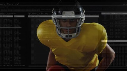 Football player holding ball in dark set initiating emerging data overlays for performance analysis - Powered by Adobe