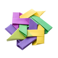 Intricate geometric origami object made with folded purple, green, and yellow paper strips. A beautiful handmade paper craft isolated on white