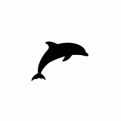 Silhouette of a Dolphin Leaping.