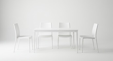 White table with four matching chairs in a bright minimalist allwhite setting