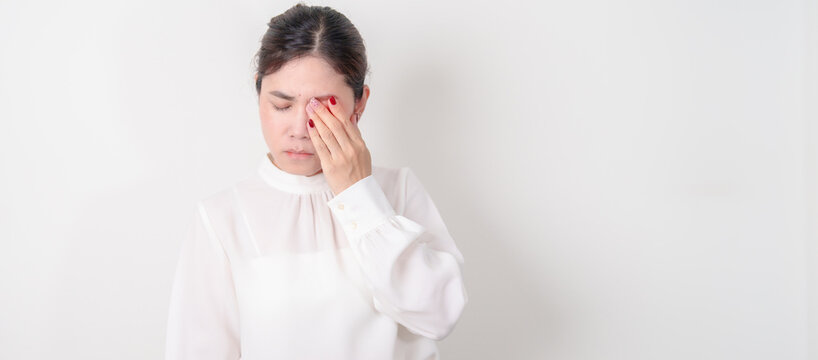 Business Woman having Eye pain and Irritation for concepts of Eye disease, Cataract, Glaucoma, Age Related Macular Degeneration, Diabetic Retinopathy, dry eyes, Conjunctivitis, World Glaucoma day - Powered by Adobe