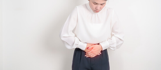 Business woman having Colon pain for Colonic disease, Inflammatory Bowel, IBD, Colorectal cancer, Ulcerative colitis, Diverticulitis, Irritable bowel syndrome, Digestive system and Health concept