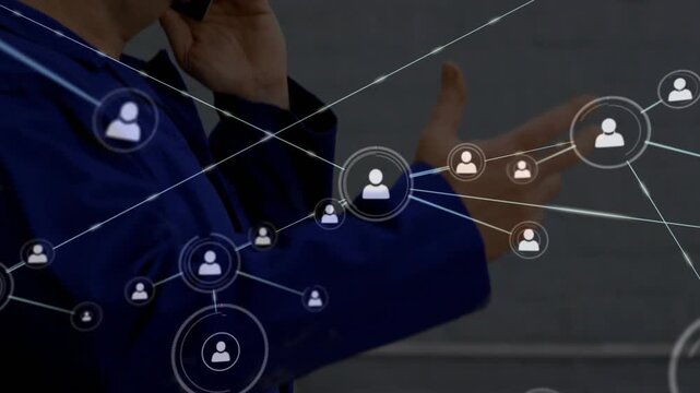 Man wearing blue blazer and eyeglasses calling on smartphone and expanding digital network overlay
