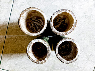 Four small bamboo remains to store buffalo milk
