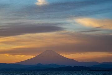 Mount Fuji at Sunset with Ocean and Colorful Sky in Japan