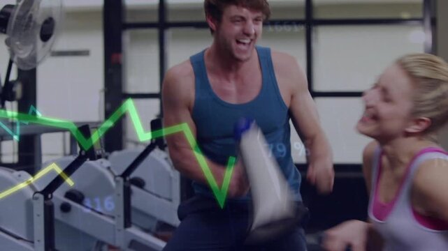 Fitness trainer grabbing megaphone shouting animating graphs as trainee rowing boosting results