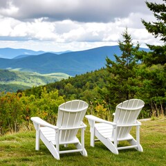 Two white Adirondack chairs overlooking a mountain vista