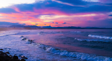 Sunset over Main Beach in Byron Bay, Australia