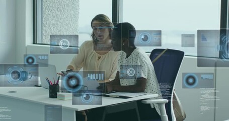 Pointing at report, team discussing business metrics as animated charts showing status - Powered by Adobe