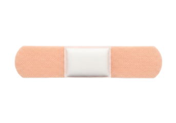 A light peach-colored adhesive bandage with a white center section sits against a black background.