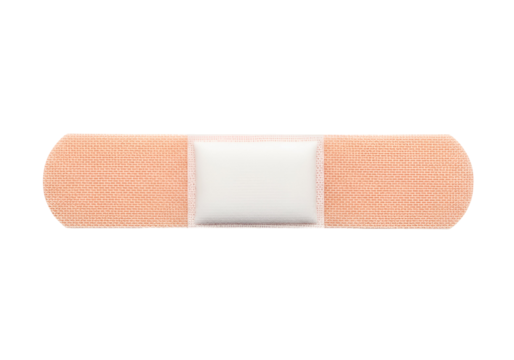 A light peach-colored adhesive bandage with a white center section sits against a black background.