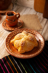 Pan de Muerto. Typical Mexican sweet bread with sesame seeds, that is consumed in the season of the day of the dead. It is a main element in the altars and offerings in the festivity.