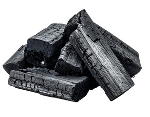Dark charcoal briquettes stacked