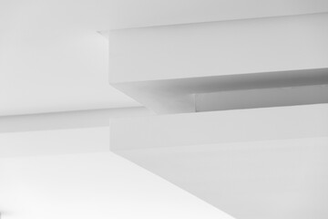 Abstract monochrome composition of sharp white beams and soft shadows