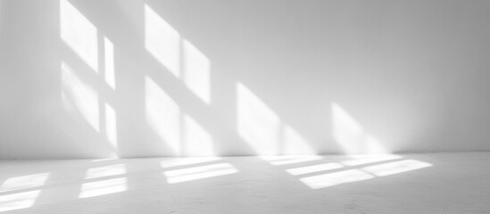 Sunlight shadows on white empty room