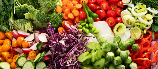 Healthy vegetarian food background. Sliced fresh vegetables.