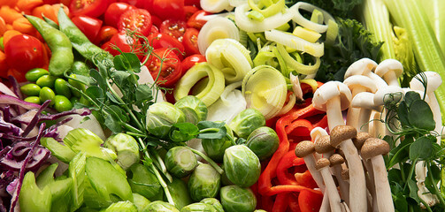 Healthy vegetarian food background. Sliced fresh vegetables.