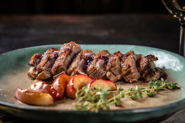 Gourmet duck breast with herb and peaches
