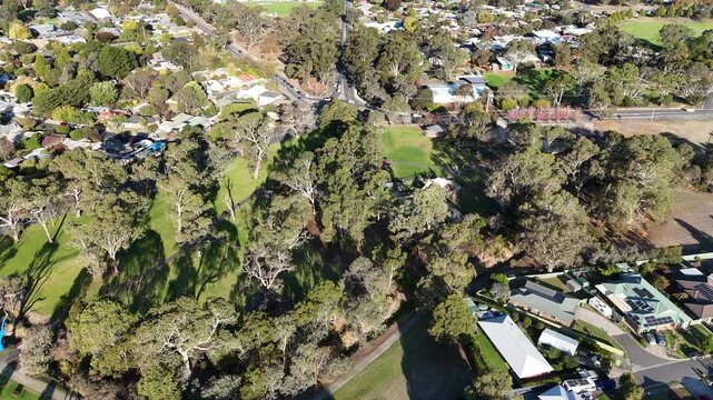 Keith Stephenson Park, Mount Barker, Adelaide Hills, South Australia &ndash; 4K Aerial Drone Footage of Traffic, Roundabout, Suburban Streets, Cars, Trees, Houses, Estates, Parklands, Urban Infrastructure
