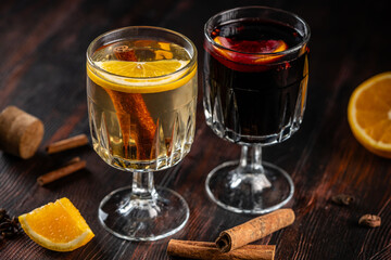 Red and white mulled wine with orange and cinnamon