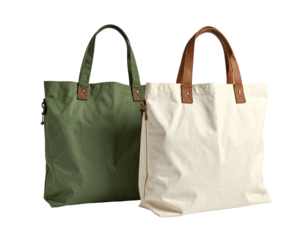 Two canvas tote bags, olive green and cream, with brown leather handles