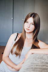 Naklejka premium Portrait of a beautiful girl with green eyes, the girl has long hair
