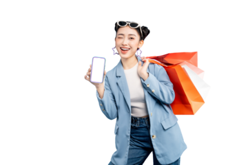portrait Asian Woman holding shopping bags and a smartphone. She is winking and smiling, showing off a blank phone screen on PNG
