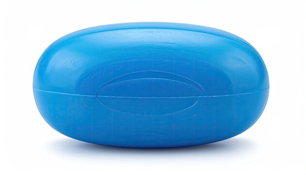 A vibrant blue, oval-shaped bar of soap, subtly textured, sits on a stark white background, showcasing its smooth, glossy surface and slightly indented center