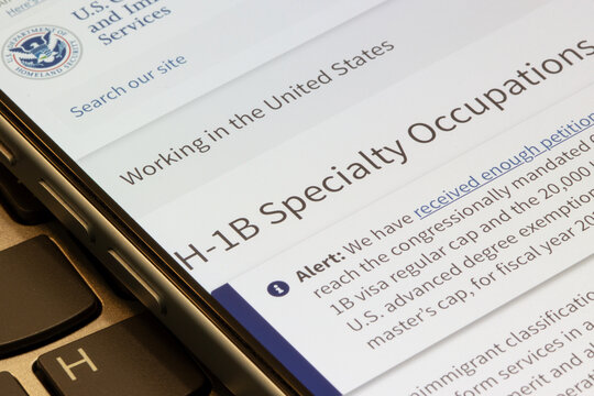Portland, OR, USA - Sep 23, 2025: Webpage about H-1B visa for foreign workers in special occupations is seen from the official U.S. Citizenship and Immigration Services (USCIS) website on an iPhone.