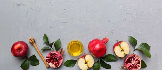 Flat lay composition with symbols jewish Rosh Hashanah holiday attributes on colored background, Rosh hashanah concept. New Year holiday Traditional. Top view with copy space