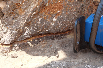 Chainsaw in action for cutting wood. worker cuts a tree trunk into logs with a saw. Close-up of a saw in motion, sawdust flying to the sides. Woodworking, wood cutting tools, wood