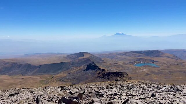 Video with a panoramic view of Mount Aragats. The frame shows majestic slopes, endless expanses and clear skies, creating a feeling of freedom and unity with nature.