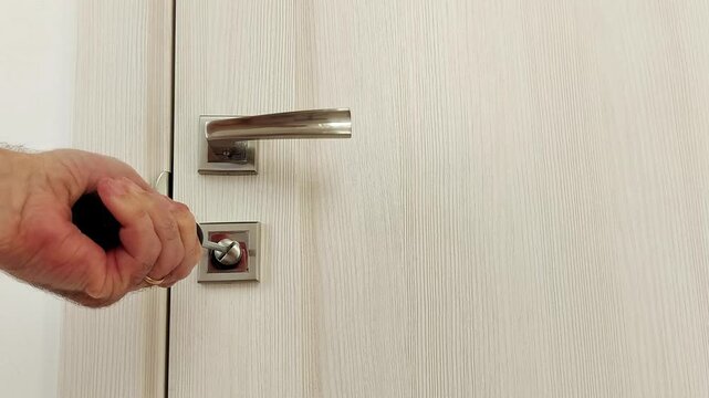 Locked door is forced open using a specialized tool. Close-up shots highlight tool placement, leverage, and mechanical action in a realistic breach scenario