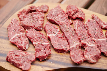 raw meat on a cutting board