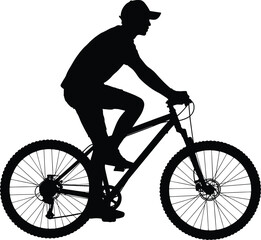 Obraz premium Silhouette of a man riding a mountain bike with cap and confident posture