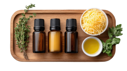 Wooden tray with essential oils, herbs, and cheese