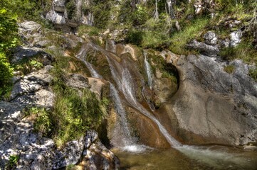 Waterfall on waterfall trail over Lofer, Austria, Europe 
