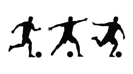 Silhouettes of soccer players in action kicking a ball