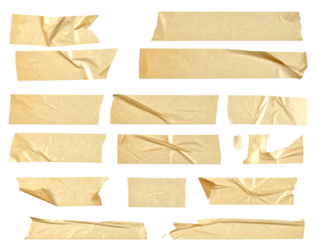 Torn pieces of light beige adhesive tape, various sizes and shapes