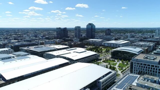 Aerial drone shot vertical farm high rise building cinematic resilient urban lifestyle stock video. elevated unmanned view tower agriculture filmic robust metro existence footage.