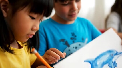 Close up children drawing marine animals conservation workshop cinematic handheld blue economy education lifestyle stock video. youthful artwork aquatic fauna preservation class filmic