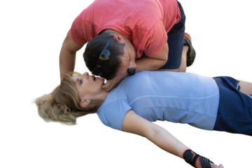Man performing cpr on unconscious woman training