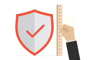 High level of security. Human hand uses wooden ruler and measures level of protection. Protective shield, high level of protection against hacker attacks, scams, cyber crime