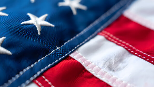 American flag: A close-up view of the American flag showcases its iconic stars and stripes, symbolizing the nation's pride and heritage. This image evokes feelings of patriotism and national unity.