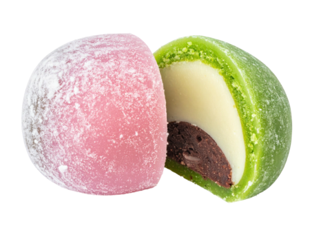 Two mochi, one pink, one green, sliced open to reveal contrasting fillings