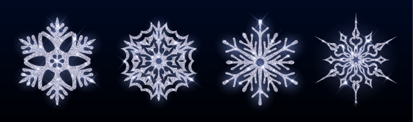 Silver glitter snowflake collection with sparkling textures for winter designs - crystal patterns on dark background. Shimmering festive decorations and holiday ornaments for seasonal projects.