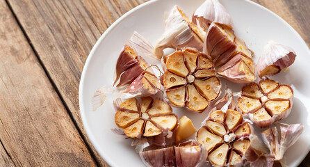 Oven roasted garlic on a plate
